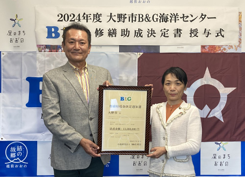 石山市長（右）、菅原理事長（左）