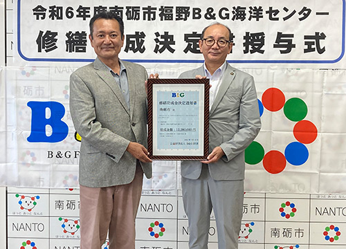 田中市長（右）、菅原理事長（左）